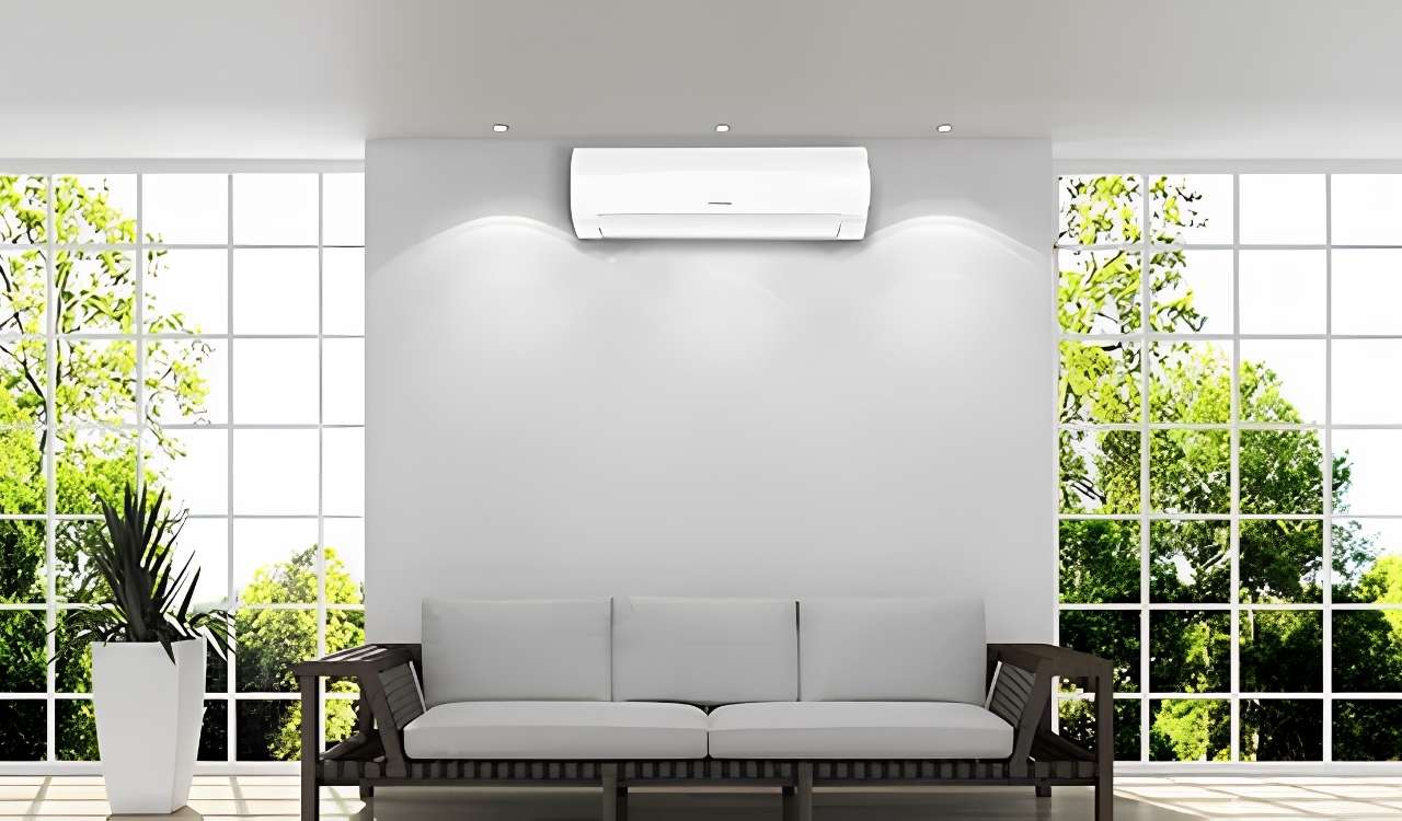 How to decorate around a wall mounted air conditioner in a modern living room