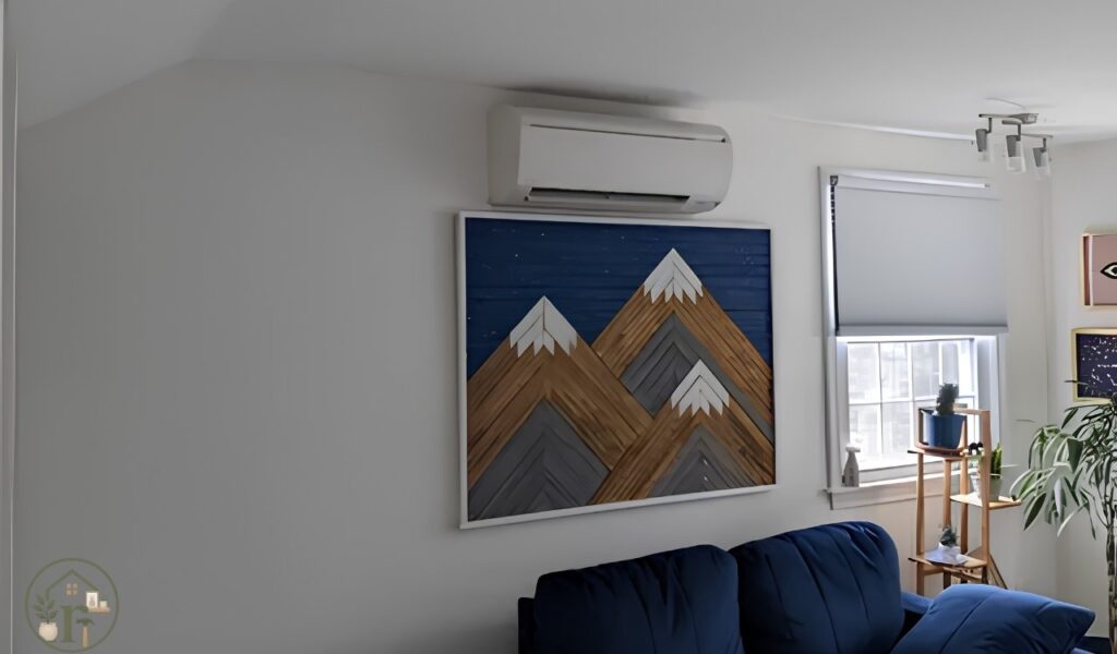 Renter friendly wall decor around a wall mounted air conditioner